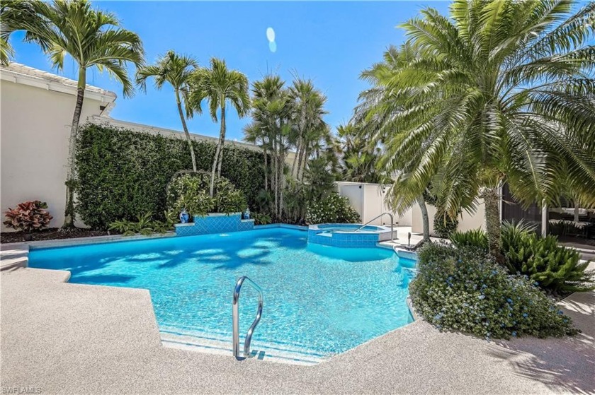 Stunning courtyard home overlooking golf course with lush - Beach Home for sale in Naples, Florida on Beachhouse.com