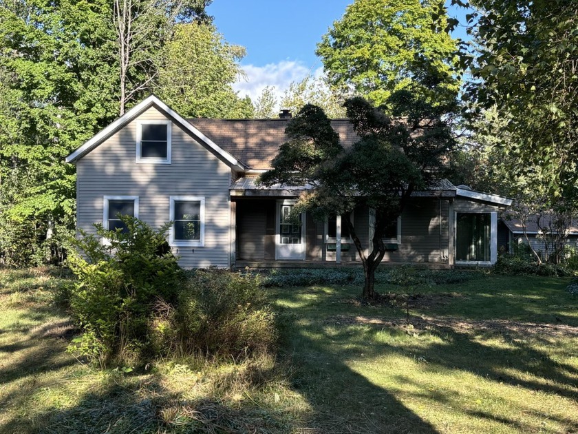 Beautiful home situated on 11.37 acres just over 4 miles south - Beach Home for sale in Petoskey, Michigan on Beachhouse.com