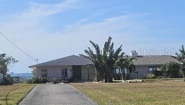 Gorgeous bayside 1960-built swinging party pad, destroyed by - Beach Home for sale in Sarasota, Florida on Beachhouse.com