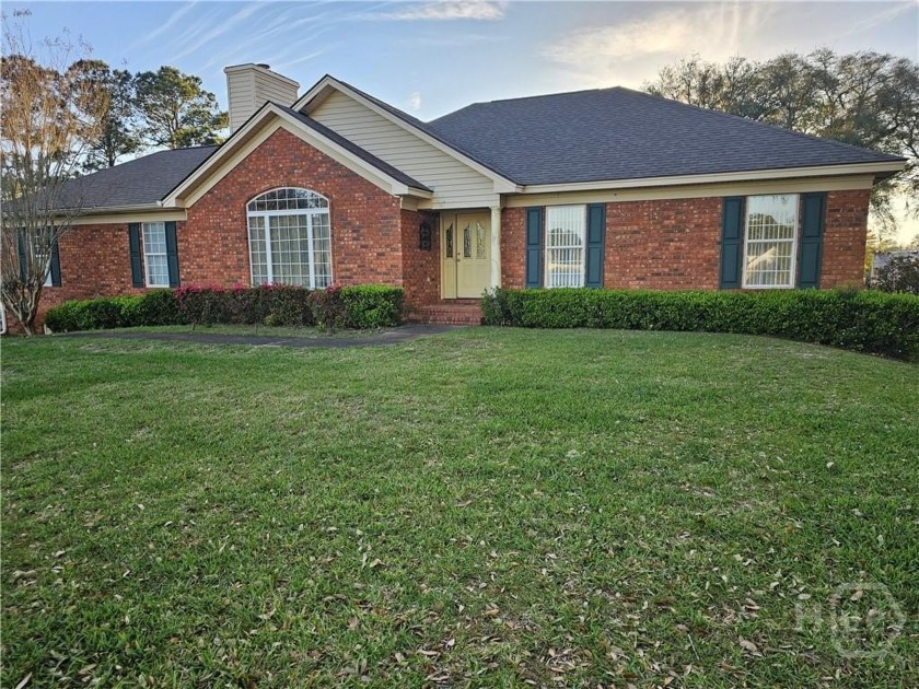 Brick home with tidal creek wrapping around back and side of - Beach Home for sale in Savannah, Georgia on Beachhouse.com