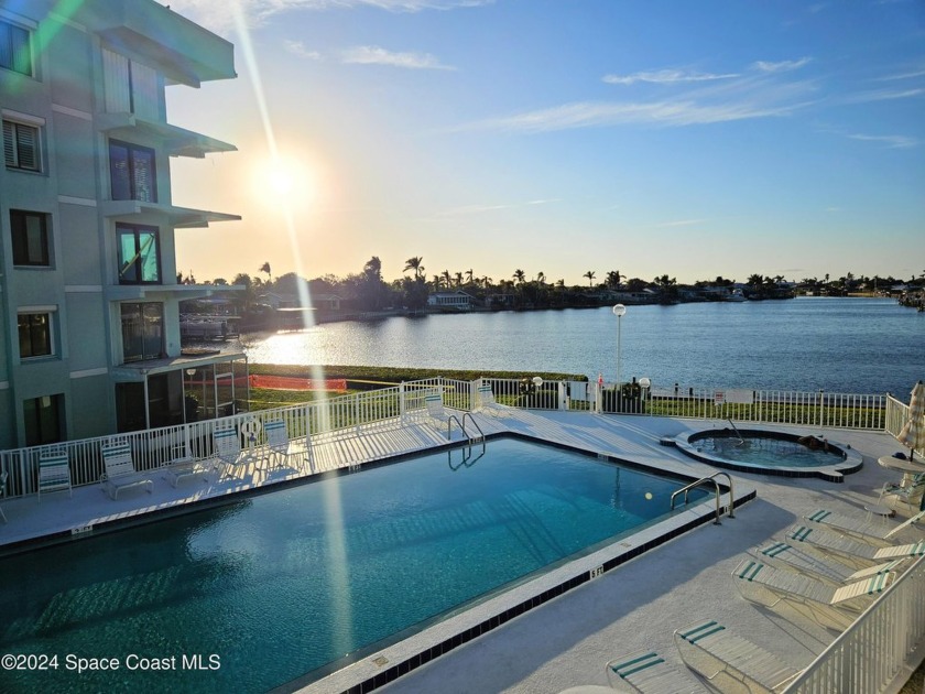 Direct Waterfront Ground Floor End Unit located on the widest - Beach Condo for sale in Cocoa Beach, Florida on Beachhouse.com