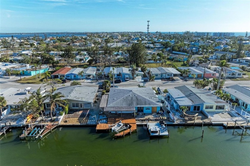 Ground floor canalfront villa at Seaside Gardens.  2BR/2BA, 1 - Beach Townhome/Townhouse for sale in Holmes Beach, Florida on Beachhouse.com