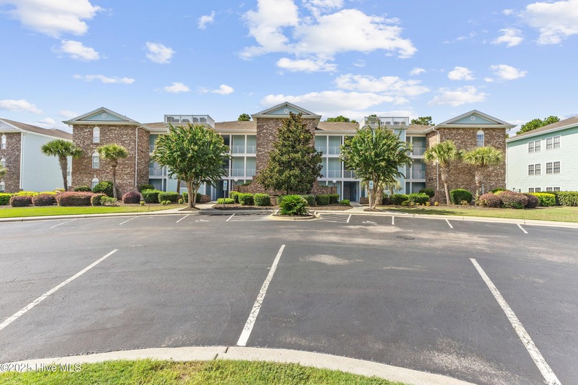 Discover easy coastal living in this spacious condo located in - Beach Condo for sale in Sunset Beach, North Carolina on Beachhouse.com