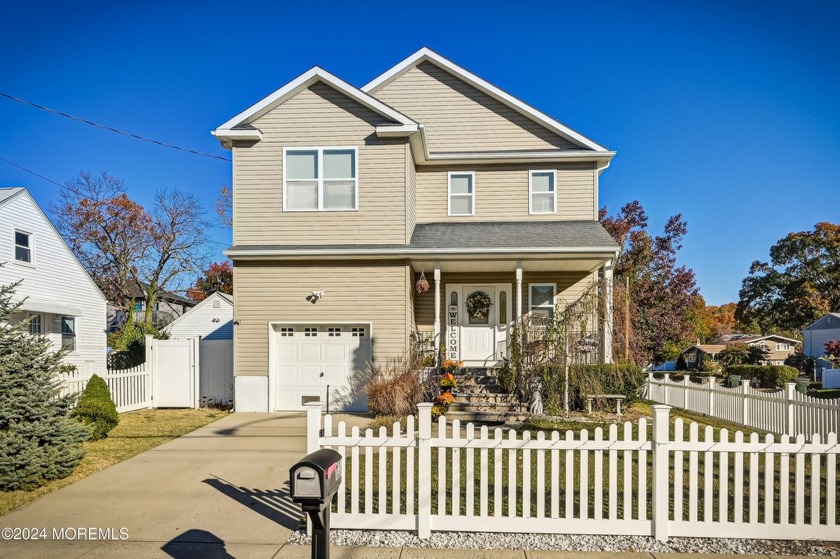 This beautiful 4 bedroom, 2.5 bath Colonial features a front - Beach Home for sale in Hazlet, New Jersey on Beachhouse.com