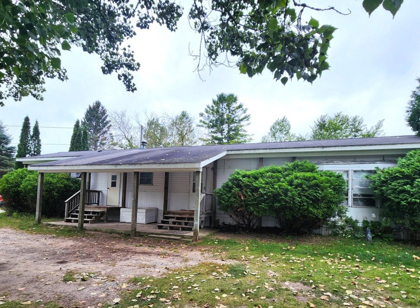 Great little spot on the Thunder Bay River. This mobile home is - Beach Home for sale in Alpena, Michigan on Beachhouse.com