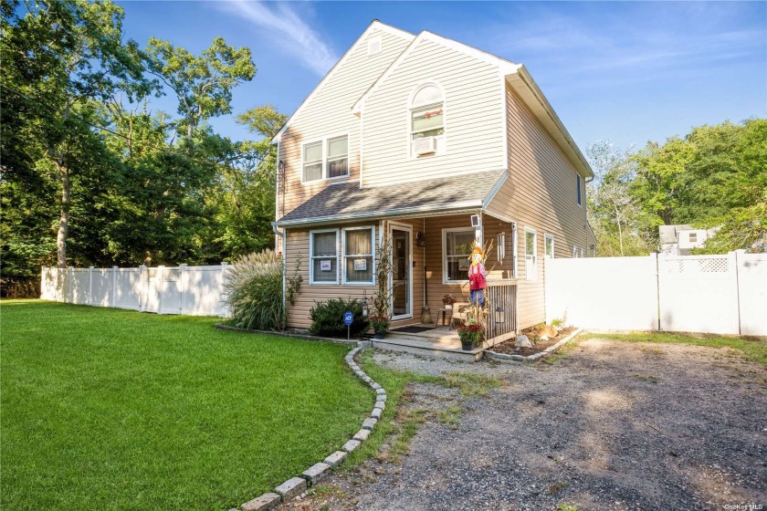 Handsome two-story home situated on an oversized lot Ideally - Beach Home for sale in Mastic Beach, New York on Beachhouse.com
