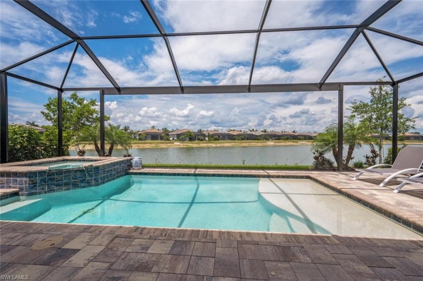This exquisite lakefront home offers upgrades and appointments - Beach Home for sale in Naples, Florida on Beachhouse.com