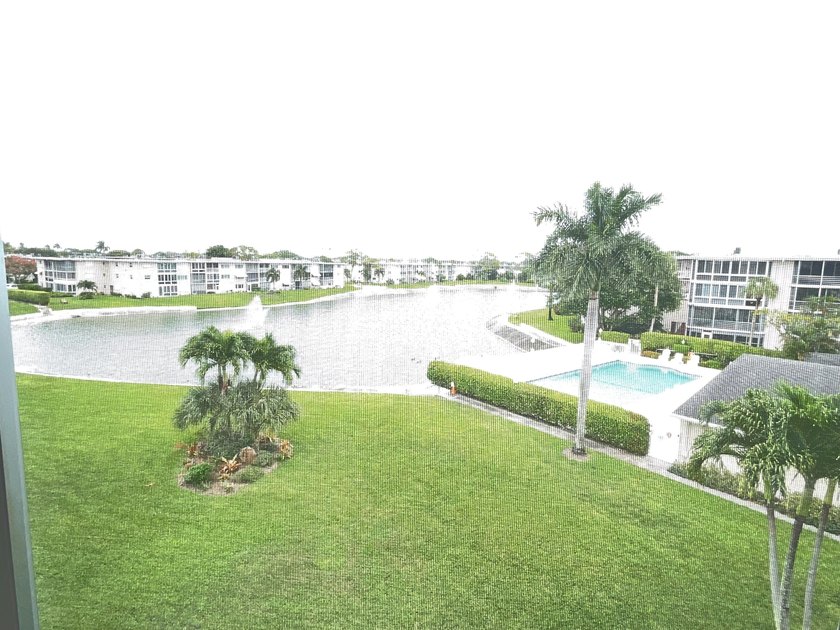 Welcome to Stunning serene lake and pool view from the private - Beach Condo for sale in Lake Worth, Florida on Beachhouse.com