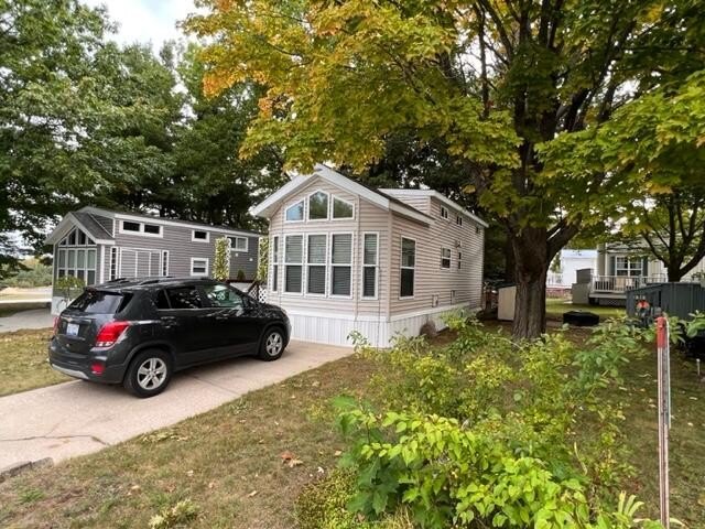 Welcome to El Rancho, where community living meets comfort! This - Beach Home for sale in Alanson, Michigan on Beachhouse.com