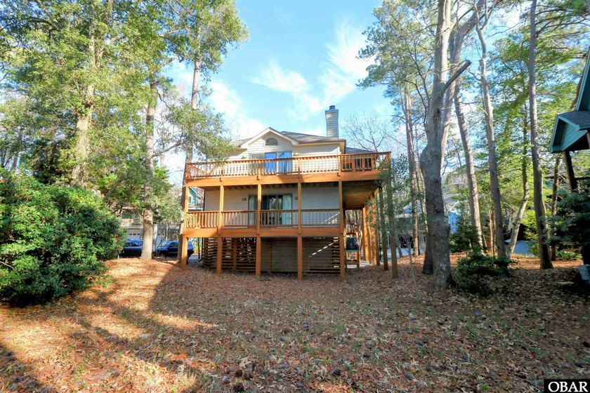 Treetop Tranquility Meets Coastal Retreat.l Escape to this - Beach Home for sale in Kill Devil Hills, North Carolina on Beachhouse.com