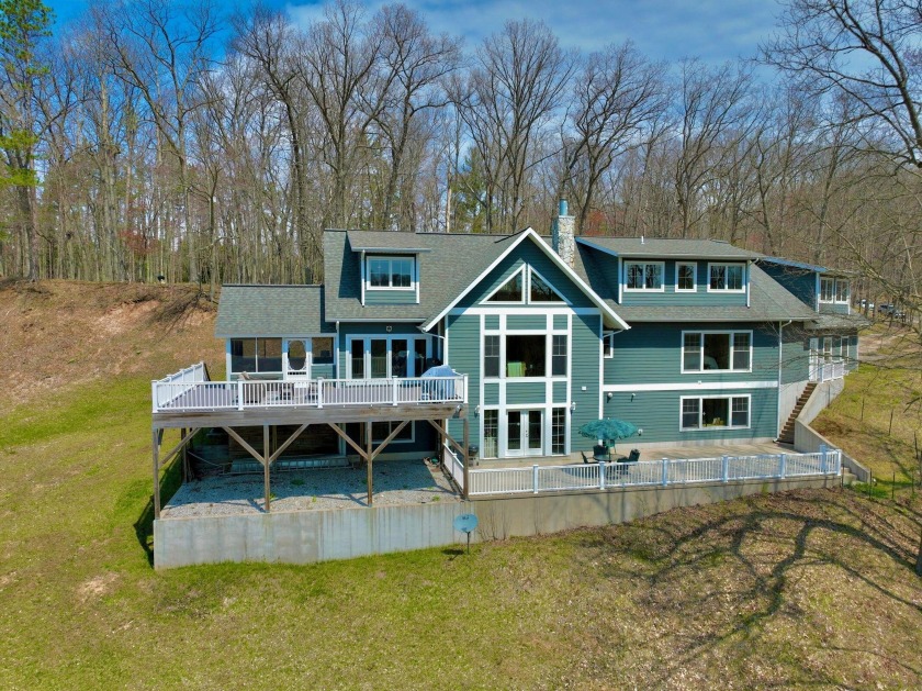 Just a few minutes' drive to downtown Ludington, this - Beach Home for sale in Ludington, Michigan on Beachhouse.com