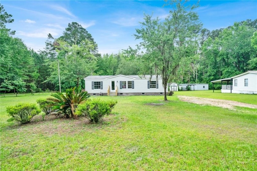 Completely updated and move-in ready, this beautiful 3-bedroom - Beach Home for sale in Midway, Georgia on Beachhouse.com