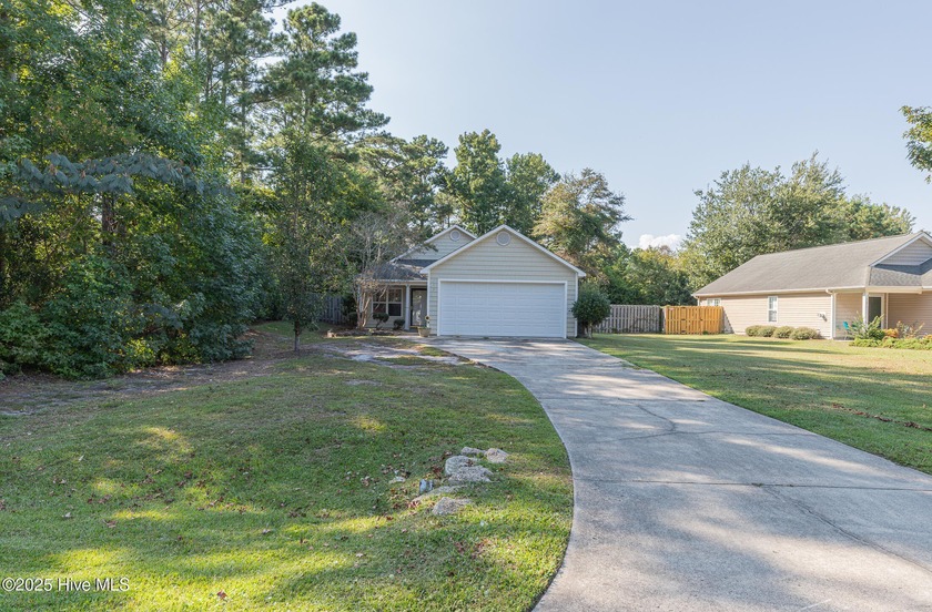 Welcome to this charming 3-bedroom, 2-bath home located in a - Beach Home for sale in Hampstead, North Carolina on Beachhouse.com