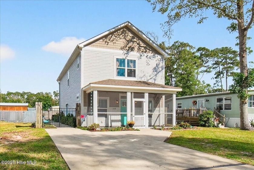 Discover a thoughtfully designed coastal retreat offering 3 - Beach Home for sale in Oak Island, North Carolina on Beachhouse.com