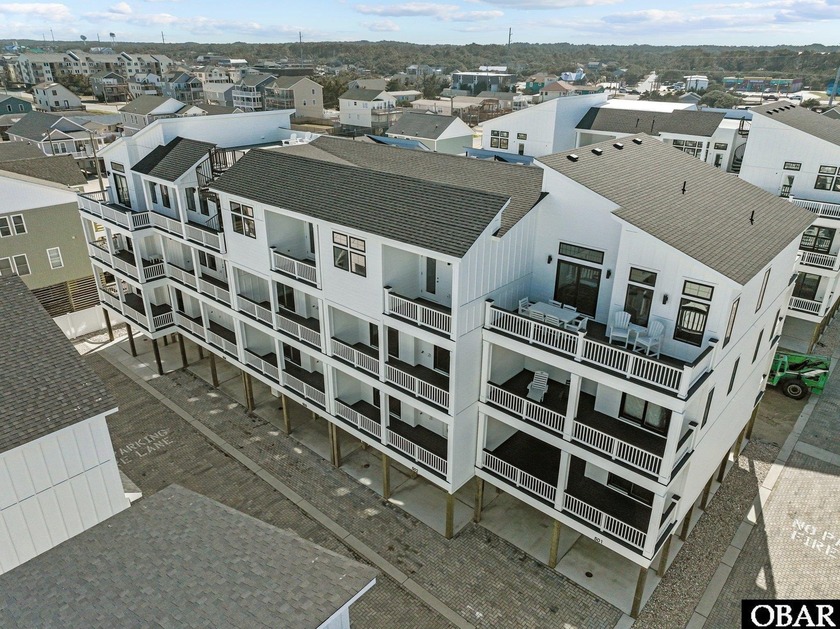This newly constructed 3-bedroom, 3.5-bathroom townhome offers - Beach Home for sale in Kill Devil Hills, North Carolina on Beachhouse.com