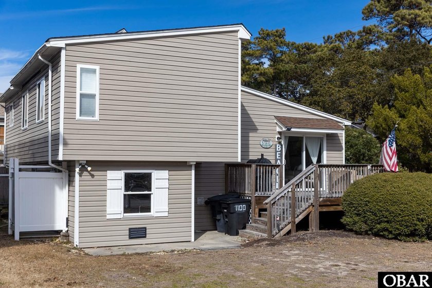 Tucked away on a corner lot just moments from Bay Drive, this - Beach Home for sale in Kill Devil Hills, North Carolina on Beachhouse.com