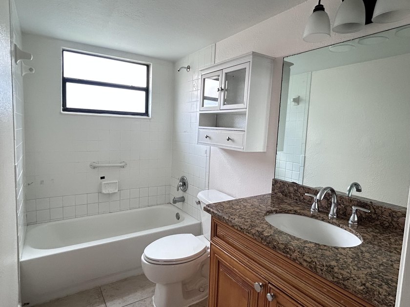 First floor corner unit featuring Water View, ceramic tile in - Beach Condo for sale in West Palm Beach, Florida on Beachhouse.com