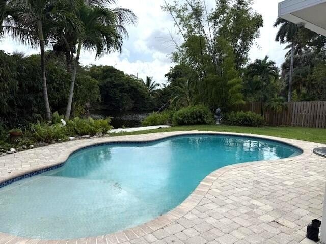 Sought after Lloyd Estates pool & waterfront home across from - Beach Home for sale in Oakland Park, Florida on Beachhouse.com