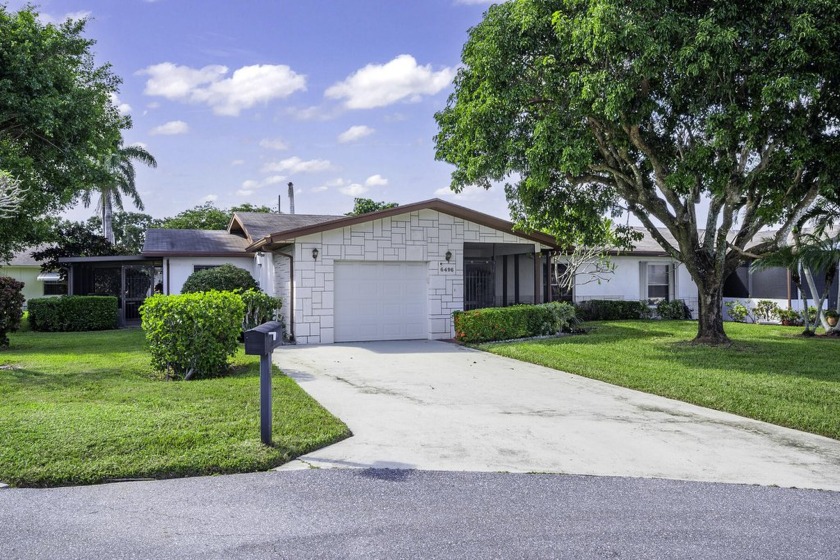 Discover tranquility at 6496 Overland Drive, a meticulously kept - Beach Home for sale in Delray Beach, Florida on Beachhouse.com