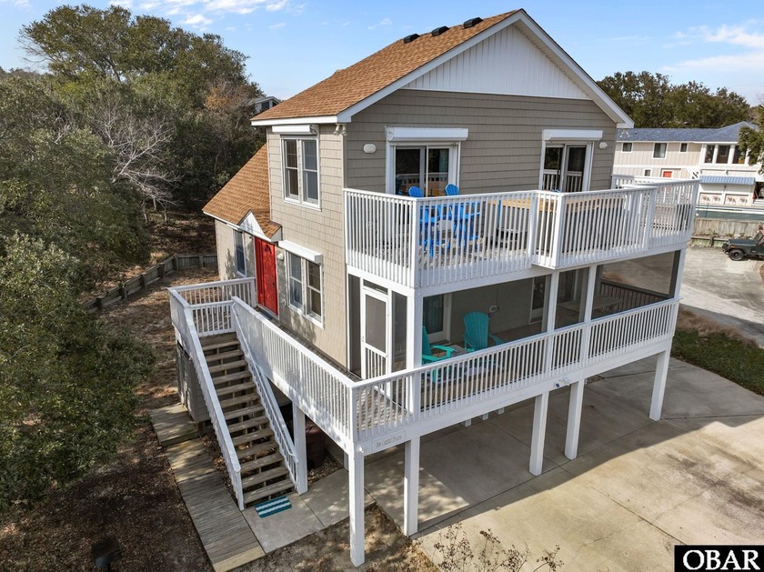 Tucked at the end of a quiet cul-de-sac, this custom-built Blue - Beach Home for sale in Southern Shores, North Carolina on Beachhouse.com