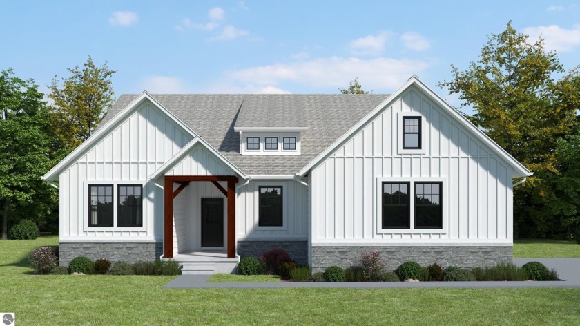 This stunning home spares no detail! Situated in desirable - Beach Home for sale in Traverse City, Michigan on Beachhouse.com