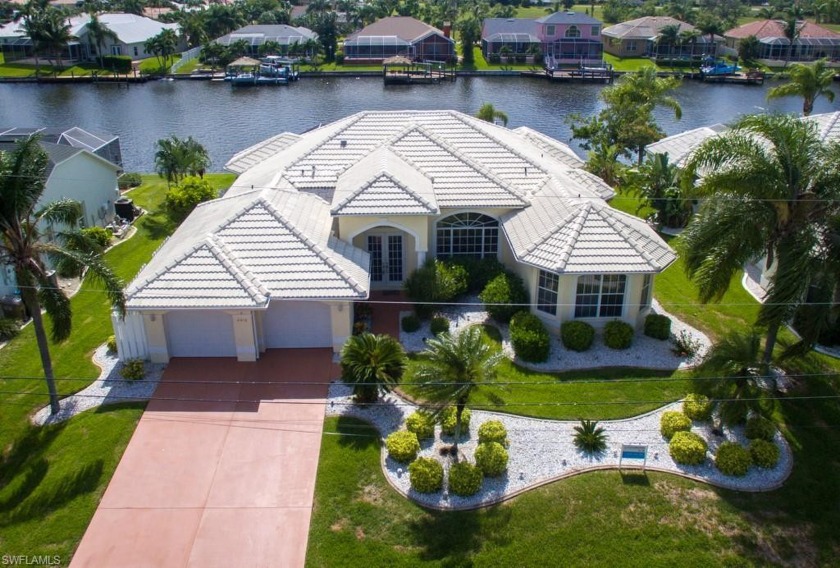 Western Exposure, 200 ft wide Gulf access canal for wonderful - Beach Home for sale in Cape Coral, Florida on Beachhouse.com