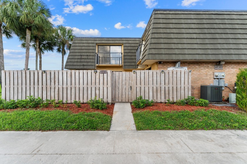 Beautiful corner lakefront townhome in the sought-after - Beach Townhome/Townhouse for sale in West Palm Beach, Florida on Beachhouse.com