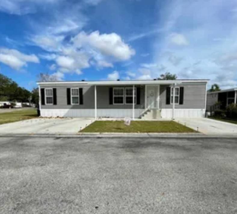 Spacious Corner-Lot Home with Split Floor Plan in Countryside - Beach Home for sale in Tampa, Florida on Beachhouse.com