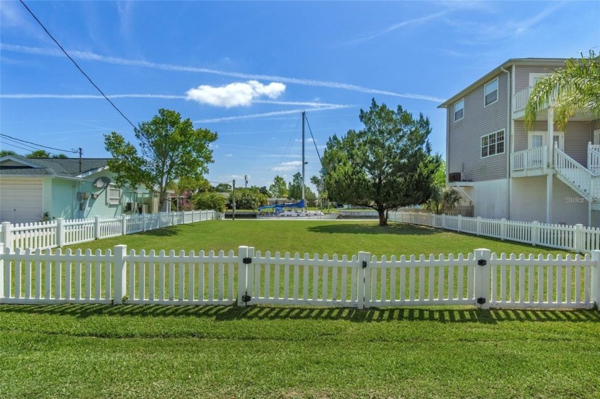 THIS BEAUTIFUL FENCED-IN WATERFRONT LOT IS LOCATED ON DEEP WATER - Beach Lot for sale in Hudson, Florida on Beachhouse.com