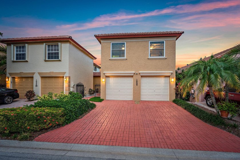 Welcome to 1088 Via Jardin, a beautifully updated residence - Beach Home for sale in Riviera Beach, Florida on Beachhouse.com