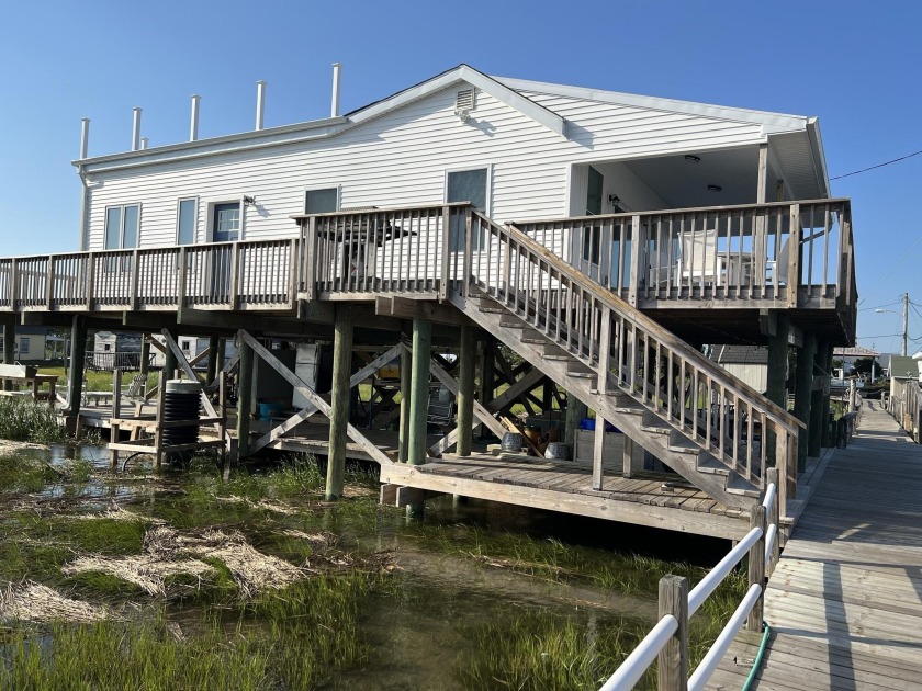 Take it easy at this unique, Bay Front Cottage with Deep-Water - Beach Home for sale in Grassy Sound, New Jersey on Beachhouse.com