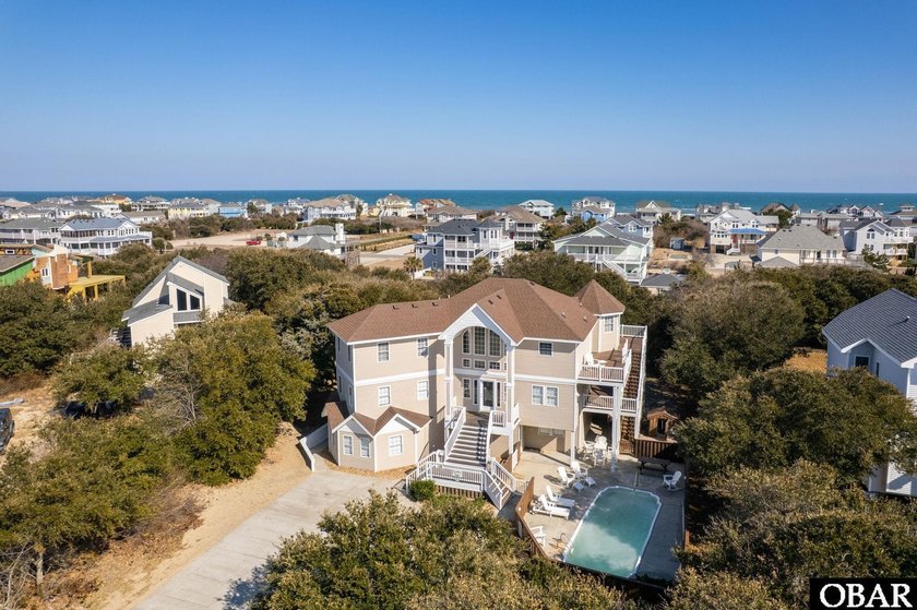 Located in Whalehead, this nearly 3,800 sqft Corolla Drive home - Beach Home for sale in Corolla, North Carolina on Beachhouse.com