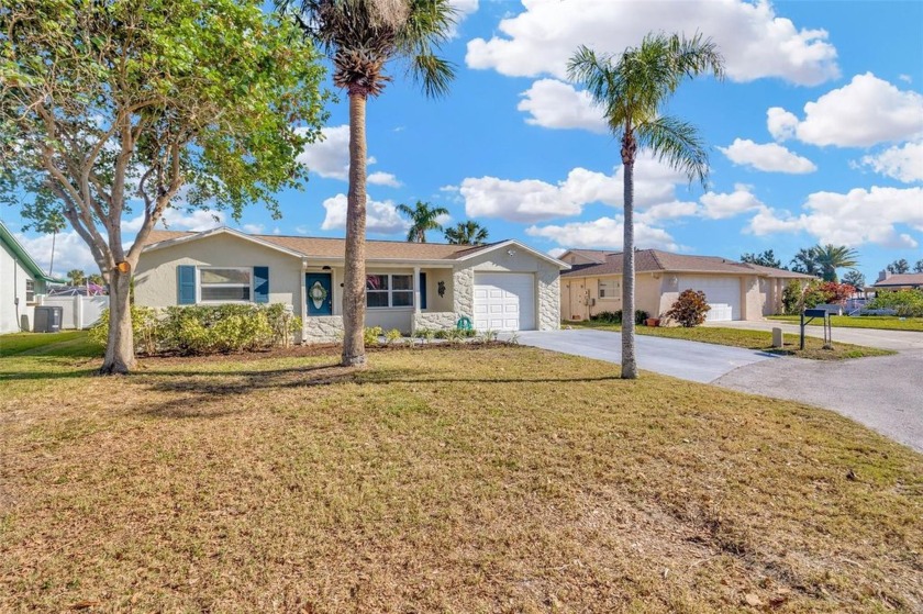 Welcome to your waterfront oasis in Hudson, Florida! This light - Beach Home for sale in Hudson, Florida on Beachhouse.com