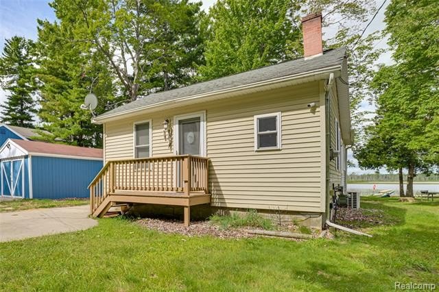 Welcome to 805 Rainbow Drive - a stunning waterfront retreat on - Beach Home for sale in East Tawas, Michigan on Beachhouse.com