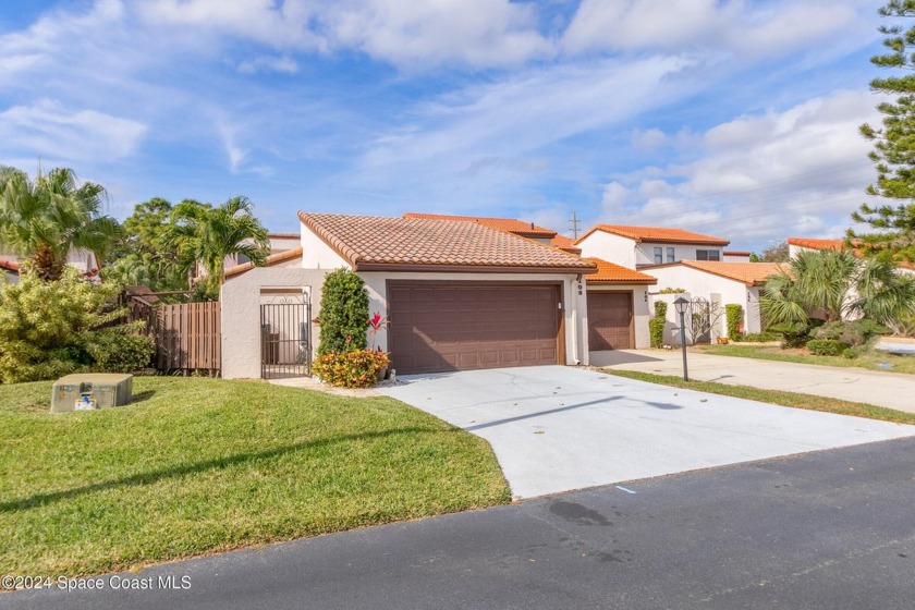 Exquisitely updated, one-story end-unit located in prestigious - Beach Townhome/Townhouse for sale in Melbourne, Florida on Beachhouse.com