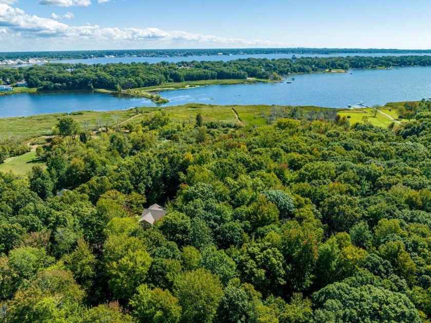 Discover the endless possibilities of this exceptional lakefront - Beach Acreage for sale in Muskegon, Michigan on Beachhouse.com