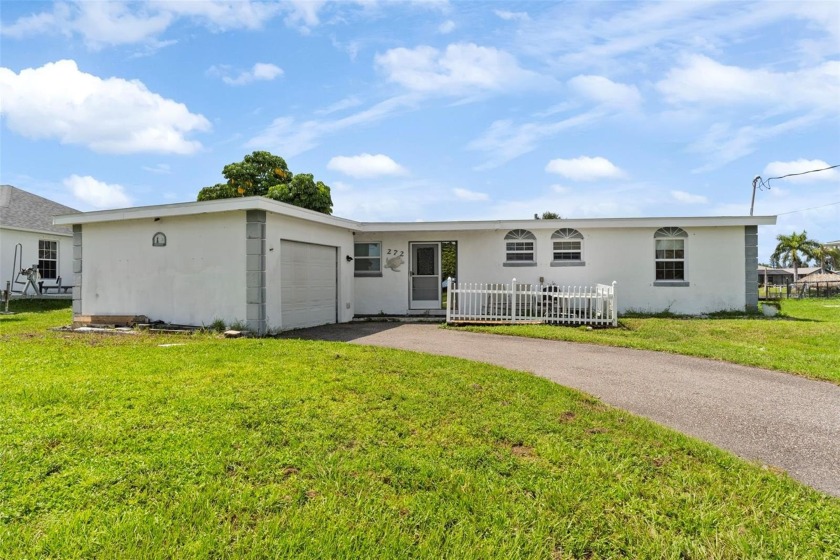 Waterfront pool home with dock and easy access to the open water - Beach Home for sale in Port Charlotte, Florida on Beachhouse.com