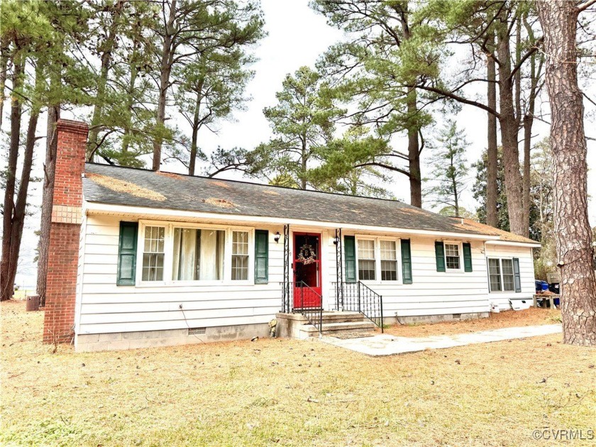 Nestled in the community of Gwynnfield, this charming Ranch - Beach Home for sale in Tappahannock, Virginia on Beachhouse.com