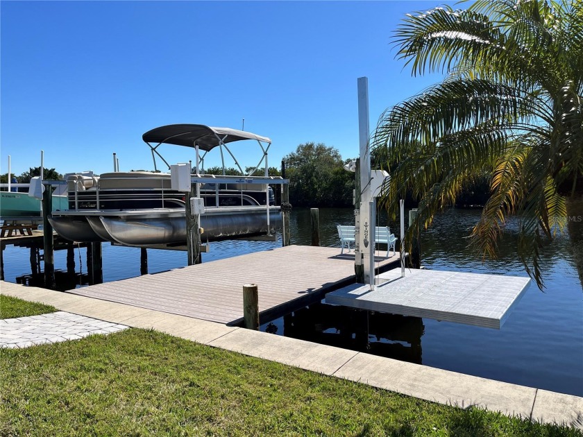 Come watch the dolphins & manatees swim by this remodeled - Beach Home for sale in St. Petersburg, Florida on Beachhouse.com