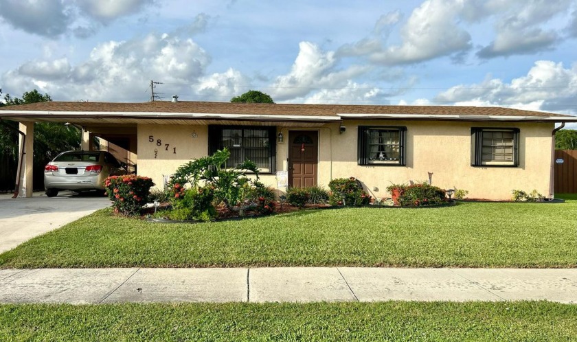 well-maintained 4-bedroom, 2-bath located in a neighborhood with - Beach Home for sale in West Palm Beach, Florida on Beachhouse.com