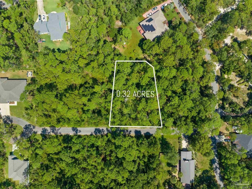 This enchanting .32-acre parcel in the Innerarity Island gated - Beach Lot for sale in Pensacola, Florida on Beachhouse.com