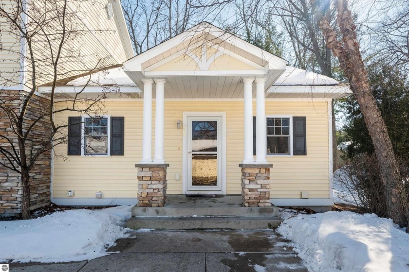 Just minutes from vibrant downtown Traverse City, this charming - Beach Condo for sale in Traverse City, Michigan on Beachhouse.com
