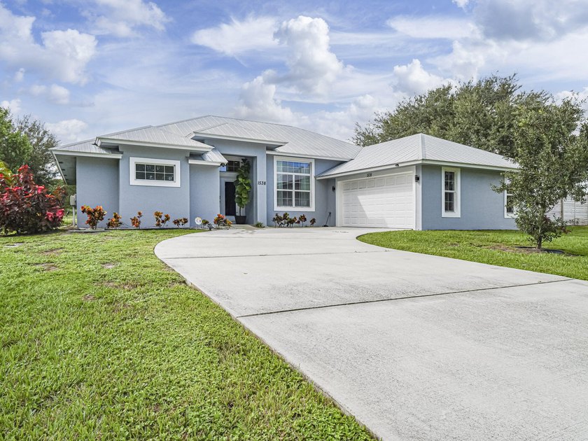 Like new, move-in ready, stunning WATERFRONT home is like an - Beach Home for sale in Port Saint Lucie, Florida on Beachhouse.com