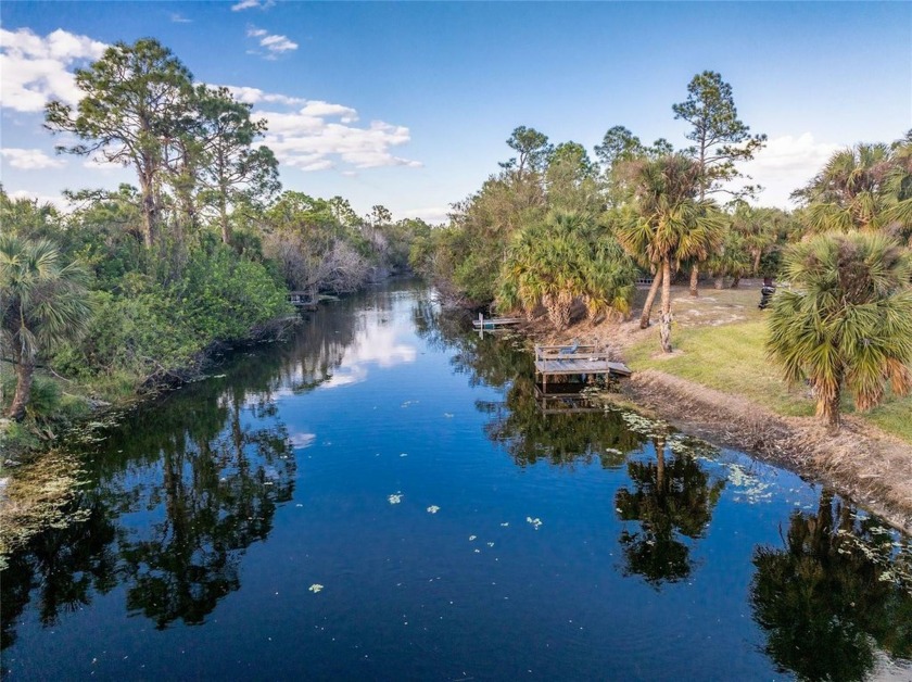 Situated on almost 1/2 acre backing up to the Newcastle Waterway - Beach Home for sale in North Port, Florida on Beachhouse.com