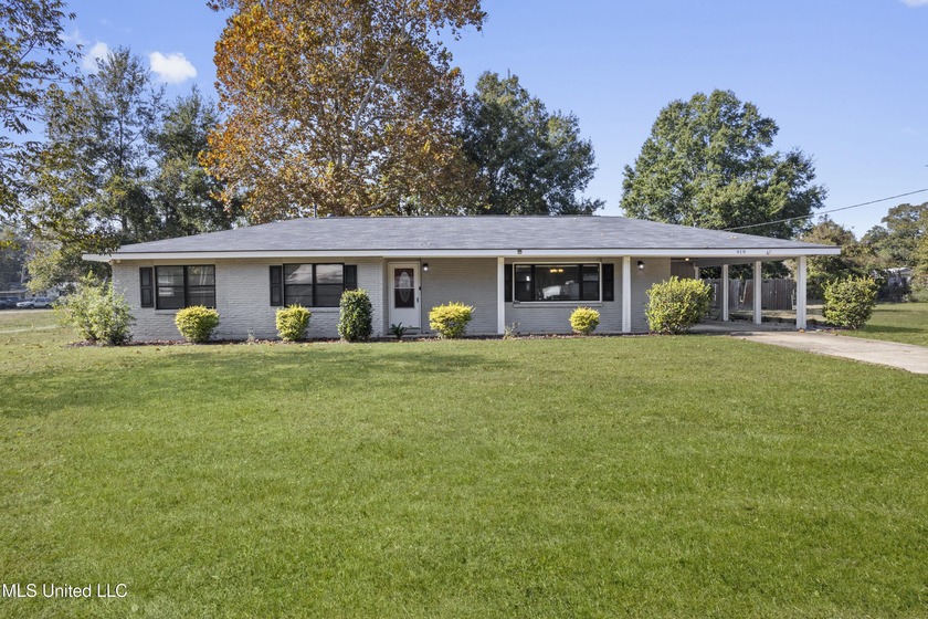 This 4-bedroom, 3-bath home offers rare flexibility with two - Beach Home for sale in Gulfport, Mississippi on Beachhouse.com