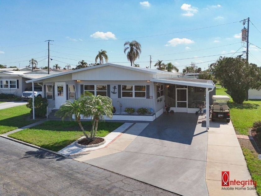 Welcome to Village on the Greens, a beautiful 55+ GATED - Beach Home for sale in Bradenton, Florida on Beachhouse.com