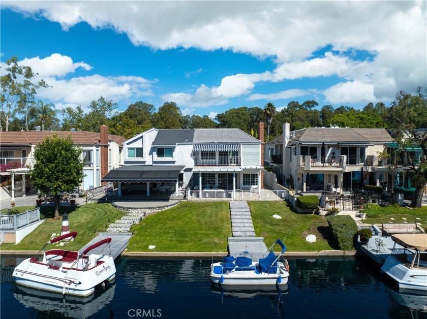 This amazing house is living with stunning lake views! This - Beach Home for sale in Lake Forest, California on Beachhouse.com