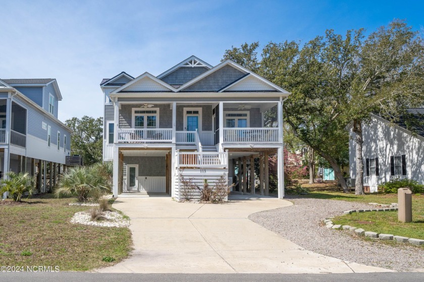 Ideal location on SE 9th with canal access for kayaks and - Beach Home for sale in Oak Island, North Carolina on Beachhouse.com