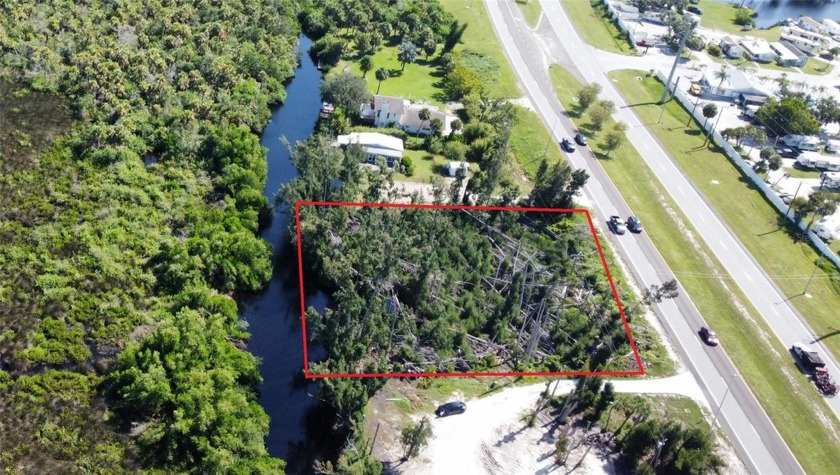 Over a half an acre on the Myakka River and U.S 41. This - Beach Lot for sale in North Port, Florida on Beachhouse.com