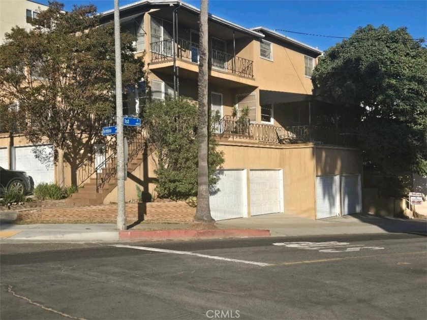 2 BEDROOM 1/4 BATHROOM. The exact corner of 1st and Termino Ave - Beach Condo for sale in Long Beach, California on Beachhouse.com